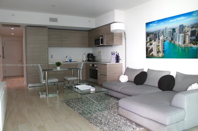 1300 S Miami Ave Unit 3108, Miami, FL 33130 - living area with visible vents, recessed lighting, and light wood-style floors