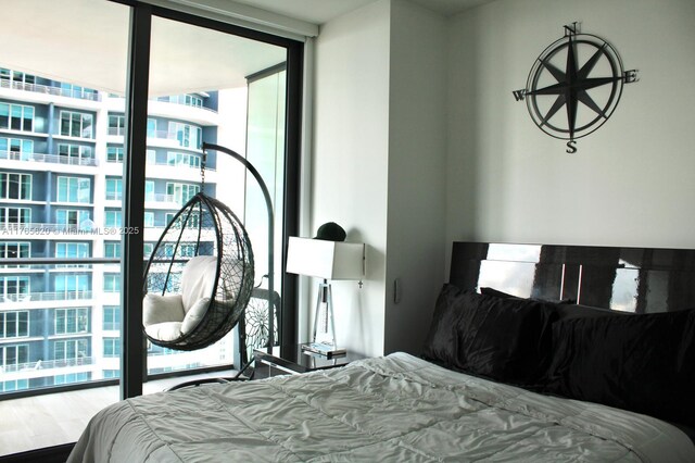 1300 S Miami Ave Unit 3108, Miami, FL 33130 - bedroom with wood finished floors and expansive windows