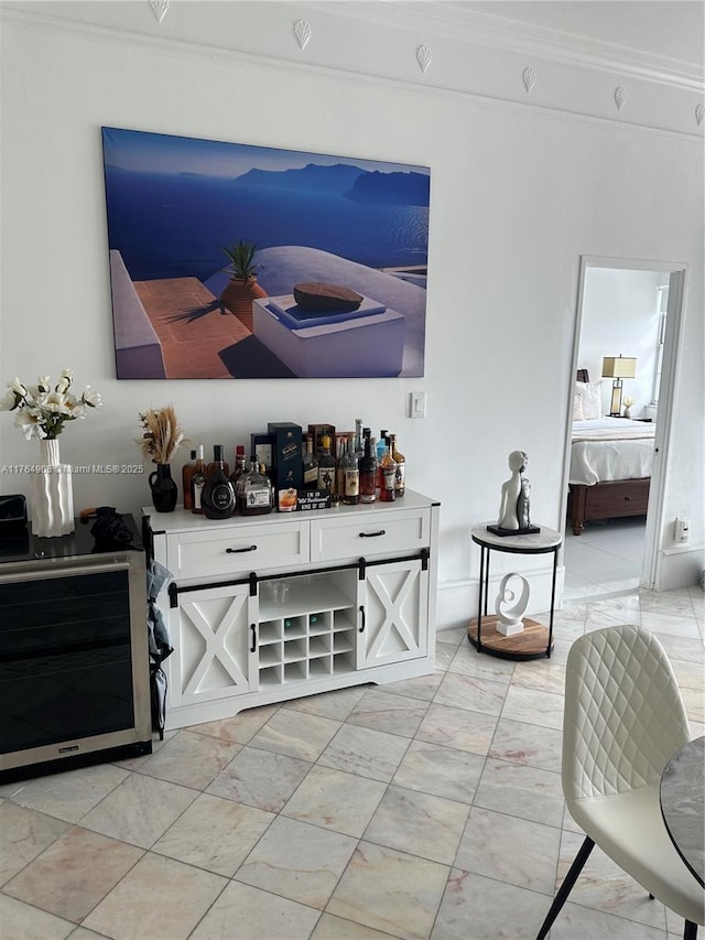 18041 Biscayne Blvd Unit Ph02, Aventura, FL 33160 - bar featuring marble finish floor, ornamental molding, and range