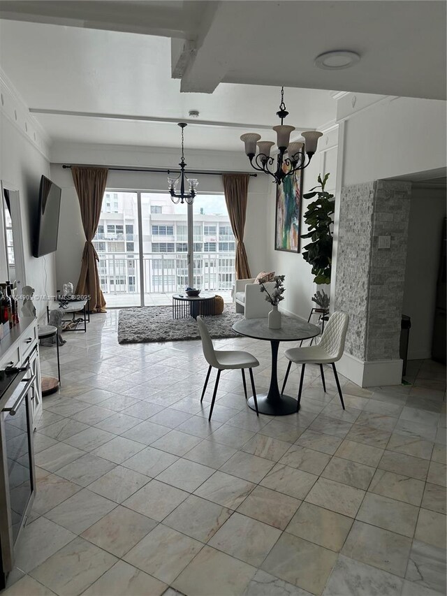 18041 Biscayne Blvd Unit Ph02, Aventura, FL 33160 - dining area featuring a notable chandelier