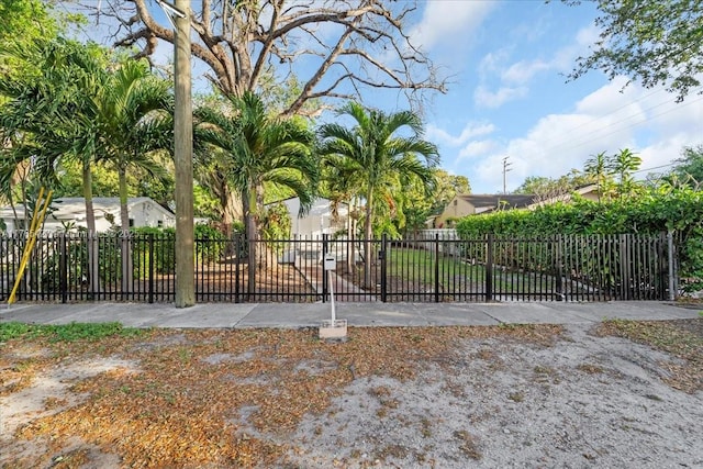 2911 NW 30th St, Miami, FL 33142 - exterior space with a fenced front yard