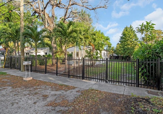 2911 NW 30th St, Miami, FL 33142 - view of gate featuring fence