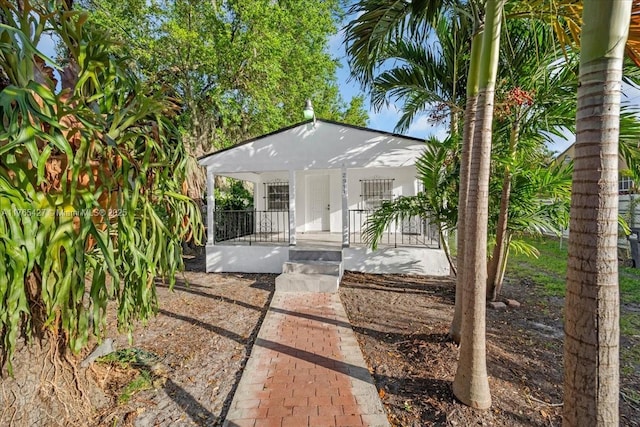 2911 NW 30th St, Miami, FL 33142 - view of patio / terrace with a porch