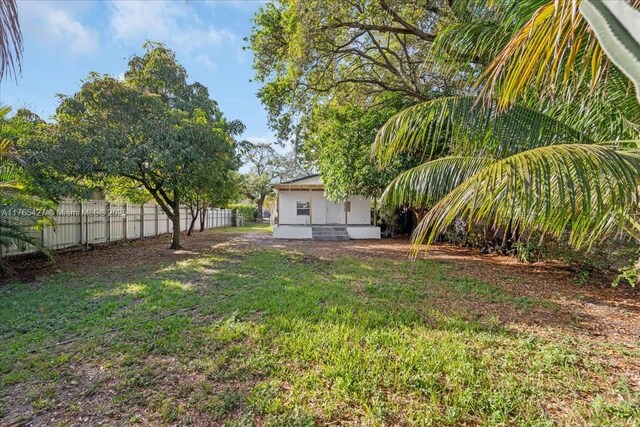 2911 NW 30th St, Miami, FL 33142 - view of yard featuring fence