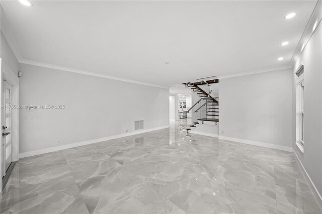 unfurnished living room featuring visible vents, marble finish floor, ornamental molding, and stairs