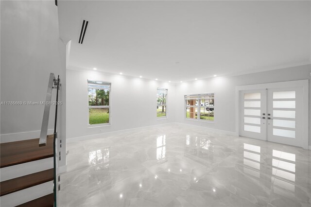 unfurnished room with french doors, baseboards, marble finish floor, and ornamental molding
