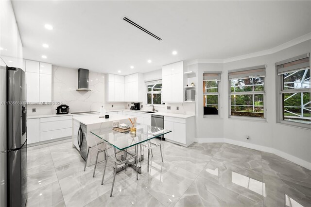 kitchen with backsplash, modern cabinets, black appliances, wall chimney exhaust hood, and open shelves