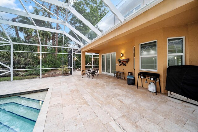sunroom / solarium featuring a healthy amount of sunlight