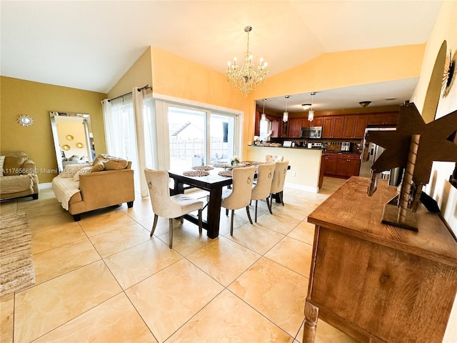 dining room with light tile patterned floors, lofted ceiling, and a chandelier