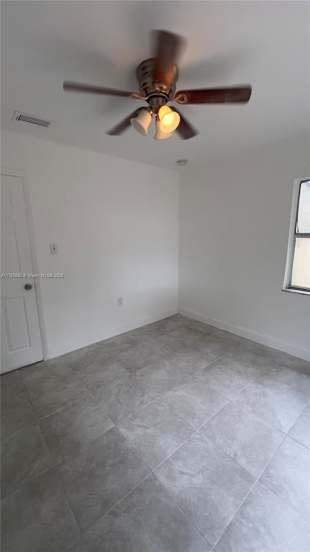 607 N 19th St, Fort Pierce, FL 34950 - empty room featuring visible vents, baseboards, and ceiling fan