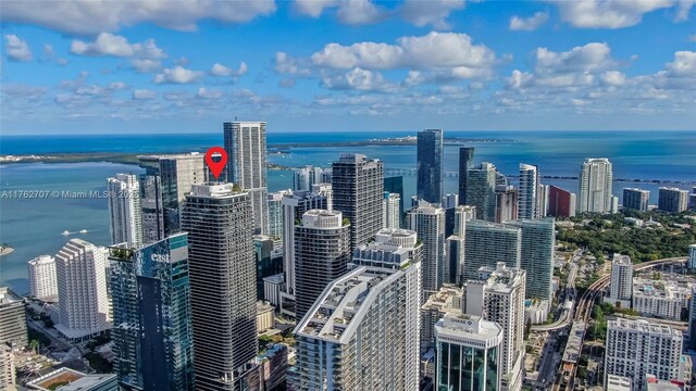 aerial view with a city view and a water view