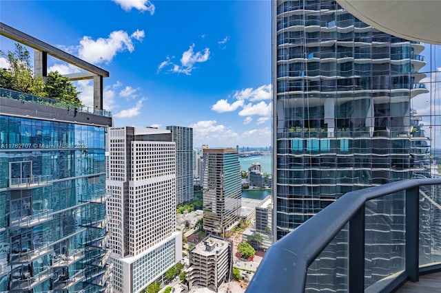 property's view of city featuring a water view