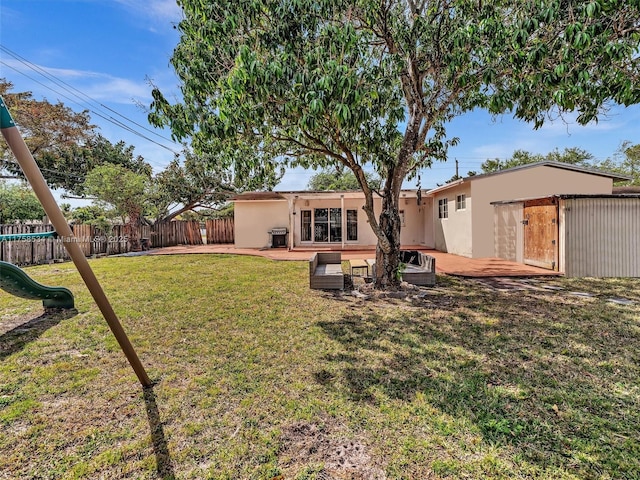 4401 Johnson St, Hollywood, FL 33021 - view of yard featuring a patio and fence