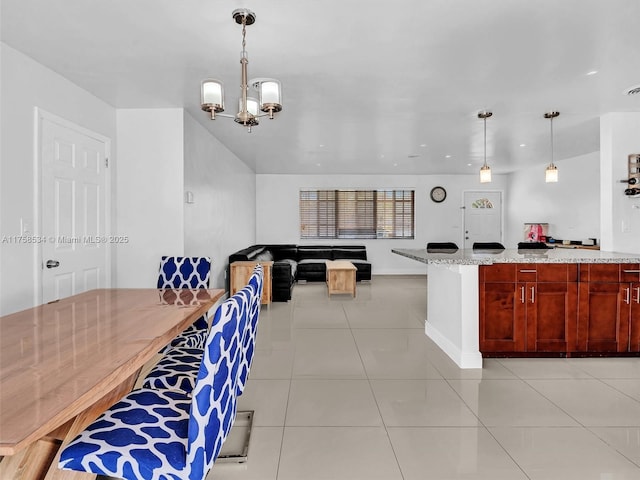 4401 Johnson St, Hollywood, FL 33021 - dining room with light tile patterned floors, a notable chandelier, and baseboards