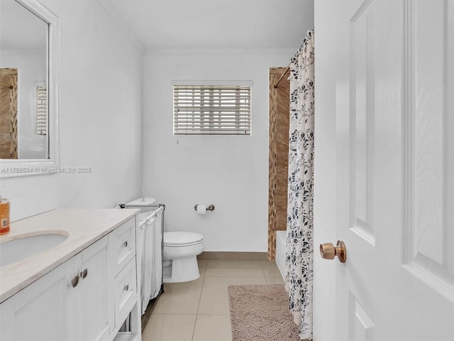 4401 Johnson St, Hollywood, FL 33021 - bathroom with baseboards, toilet, ornamental molding, tile patterned floors, and vanity