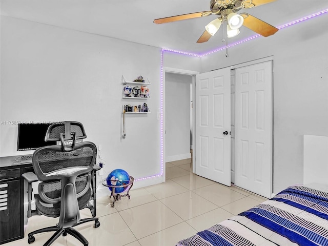 4401 Johnson St, Hollywood, FL 33021 - bedroom with ceiling fan, a closet, baseboards, and light tile patterned flooring