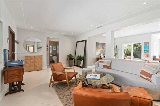 living area with baseboards, visible vents, recessed lighting, and light tile patterned floors