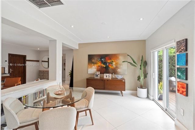 dining space featuring baseboards, visible vents, tile patterned floors, and recessed lighting