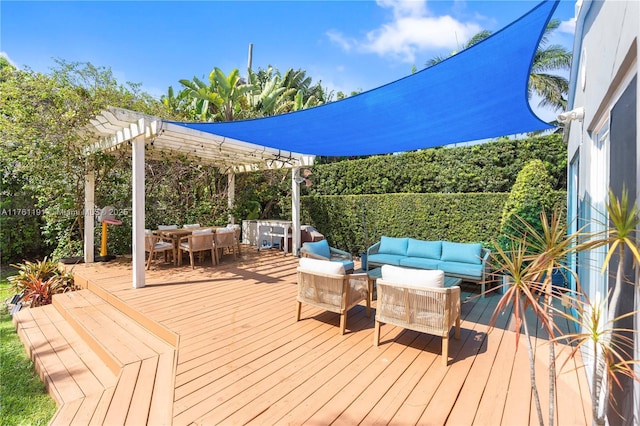 wooden terrace with an outdoor hangout area, a pergola, and outdoor dining space