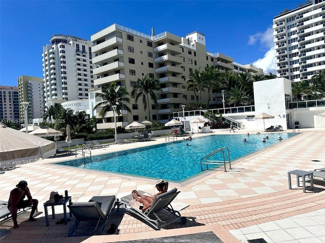 100 Lincoln Rd Unit 1231, Miami Beach, FL 33139 - community pool with a patio area and fence