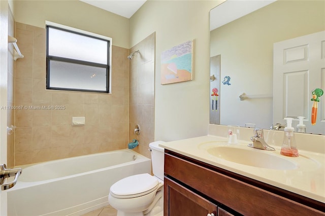 bathroom featuring vanity, toilet, and shower / bathing tub combination