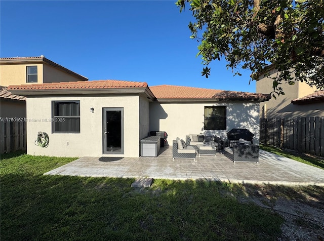 23906 SW 116th Ct, Homestead, FL 33032 - rear view of property with outdoor lounge area, a patio, stucco siding, and a tiled roof