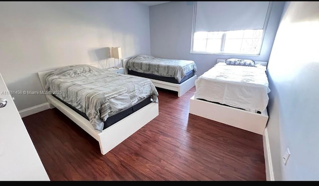 19555 E Country Club Dr Unit 8507, Aventura, FL 33180 - bedroom with wood finished floors and baseboards