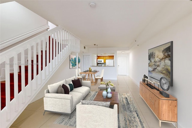 1650 Coral Way Unit Ph-9, Miami, FL 33145 - living area featuring light tile patterned floors and stairs
