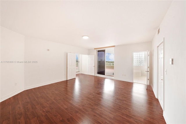 1650 Coral Way Unit Ph-9, Miami, FL 33145 - unfurnished room with wood finished floors and baseboards