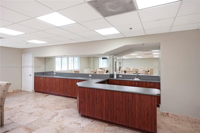 1650 Coral Way Unit Ph-9, Miami, FL 33145 - kitchen with a drop ceiling, dark countertops, and modern cabinets