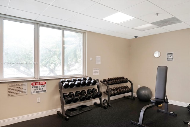 1650 Coral Way Unit Ph-9, Miami, FL 33145 - workout room featuring baseboards and a drop ceiling