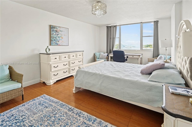 4400 Hillcrest Dr Unit 720C, Hollywood, FL 33021 - bedroom featuring wood finished floors and baseboards