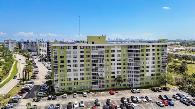 4400 Hillcrest Dr Unit 720C, Hollywood, FL 33021 - view of building exterior featuring uncovered parking and a view of skyline