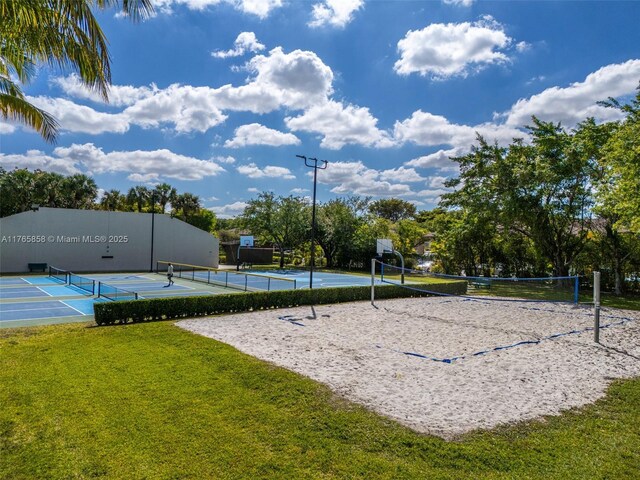 9805 NW 52nd St Unit 215, Doral, FL 33178 - view of property's community with a tennis court, a yard, fence, and volleyball court