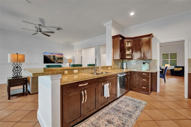 kitchen with a peninsula, a sink, black range with electric cooktop, dishwasher, and light tile patterned floors