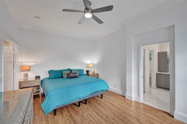 bedroom featuring baseboards, wood finished floors, ornamental molding, and ceiling fan