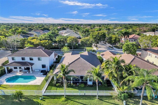 aerial view featuring a residential view and a water view