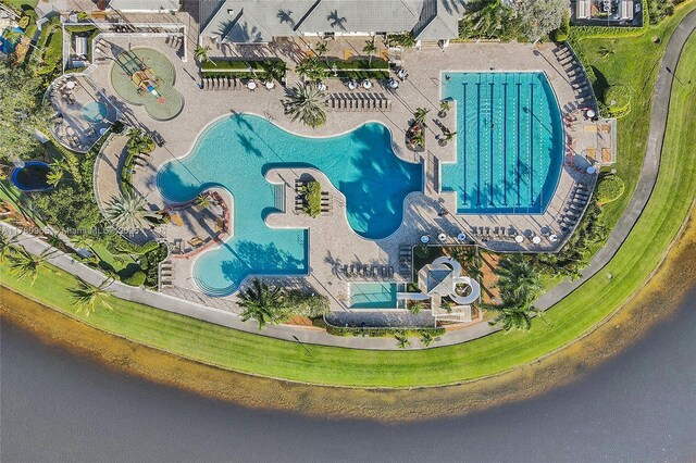 drone / aerial view with a water view