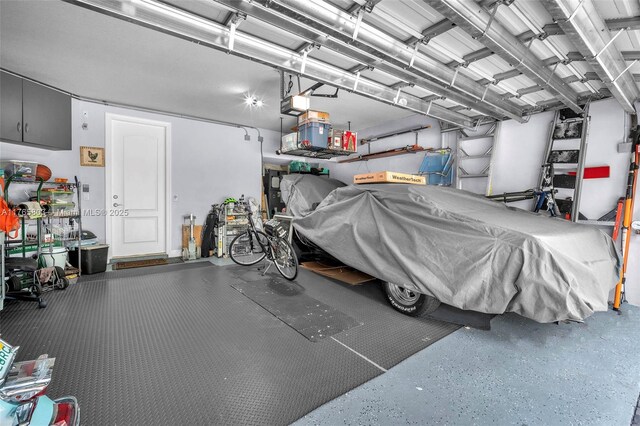 616 NE Venezia Ln Unit 616, Boca Raton, FL 33487 - garage with a garage door opener