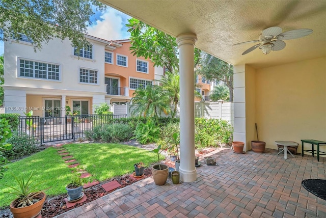 616 NE Venezia Ln Unit 616, Boca Raton, FL 33487 - view of patio / terrace featuring a ceiling fan and fence