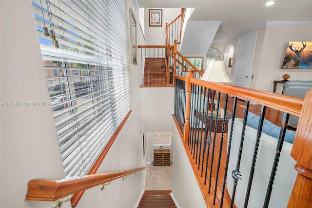 616 NE Venezia Ln Unit 616, Boca Raton, FL 33487 - staircase featuring ornamental molding, recessed lighting, arched walkways, carpet flooring, and baseboards