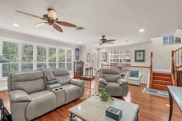 616 NE Venezia Ln Unit 616, Boca Raton, FL 33487 - living room with a ceiling fan, light wood-type flooring, and a wealth of natural light