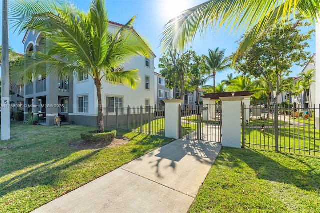 6831 SW 44th St Unit 112, Miami, FL 33155 - exterior space with a lawn and a fenced front yard