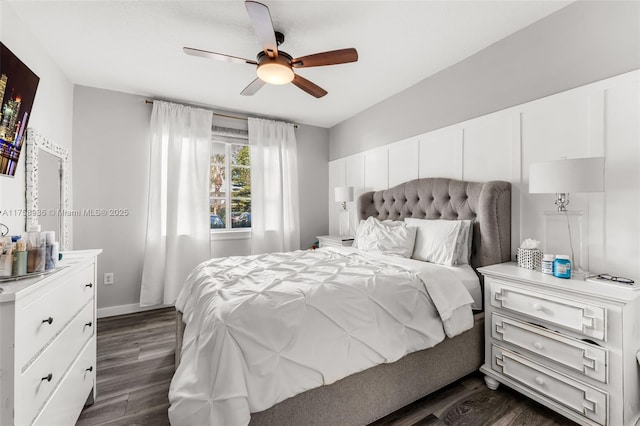 6831 SW 44th St Unit 112, Miami, FL 33155 - bedroom with baseboards, ceiling fan, and dark wood-style flooring