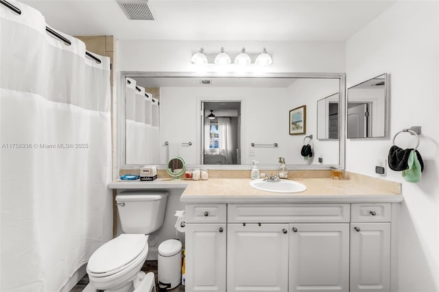 6831 SW 44th St Unit 112, Miami, FL 33155 - bathroom with visible vents, toilet, vanity, and a shower with shower curtain