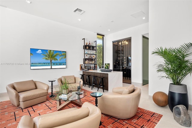 22 Isla Bahia Dr, Fort Lauderdale, FL 33316 - living area with visible vents, recessed lighting, and a bar