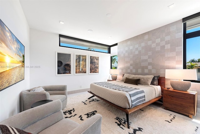 22 Isla Bahia Dr, Fort Lauderdale, FL 33316 - bedroom with an accent wall and baseboards