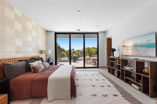 22 Isla Bahia Dr, Fort Lauderdale, FL 33316 - bedroom with floor to ceiling windows, access to outside, and baseboards