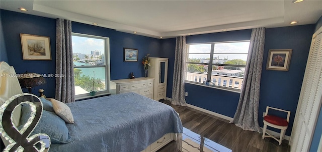 8530 Byron Ave Unit 502, Miami Beach, FL 33141 - bedroom featuring dark wood finished floors and recessed lighting