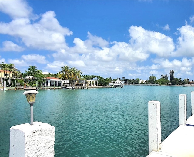 8530 Byron Ave Unit 502, Miami Beach, FL 33141 - dock area featuring a water view